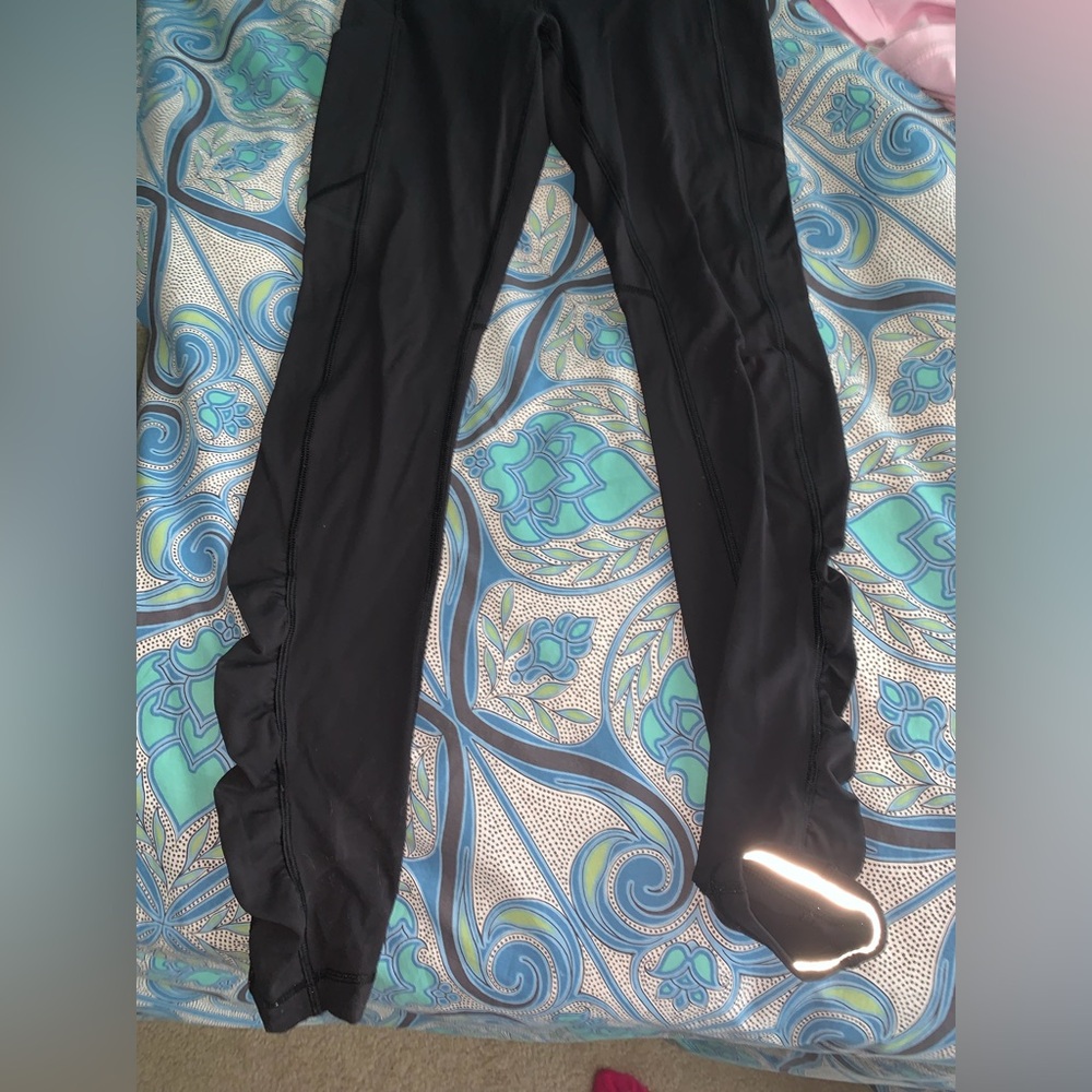 lululemon athletica Black Leggings with pockets and ruffle sides